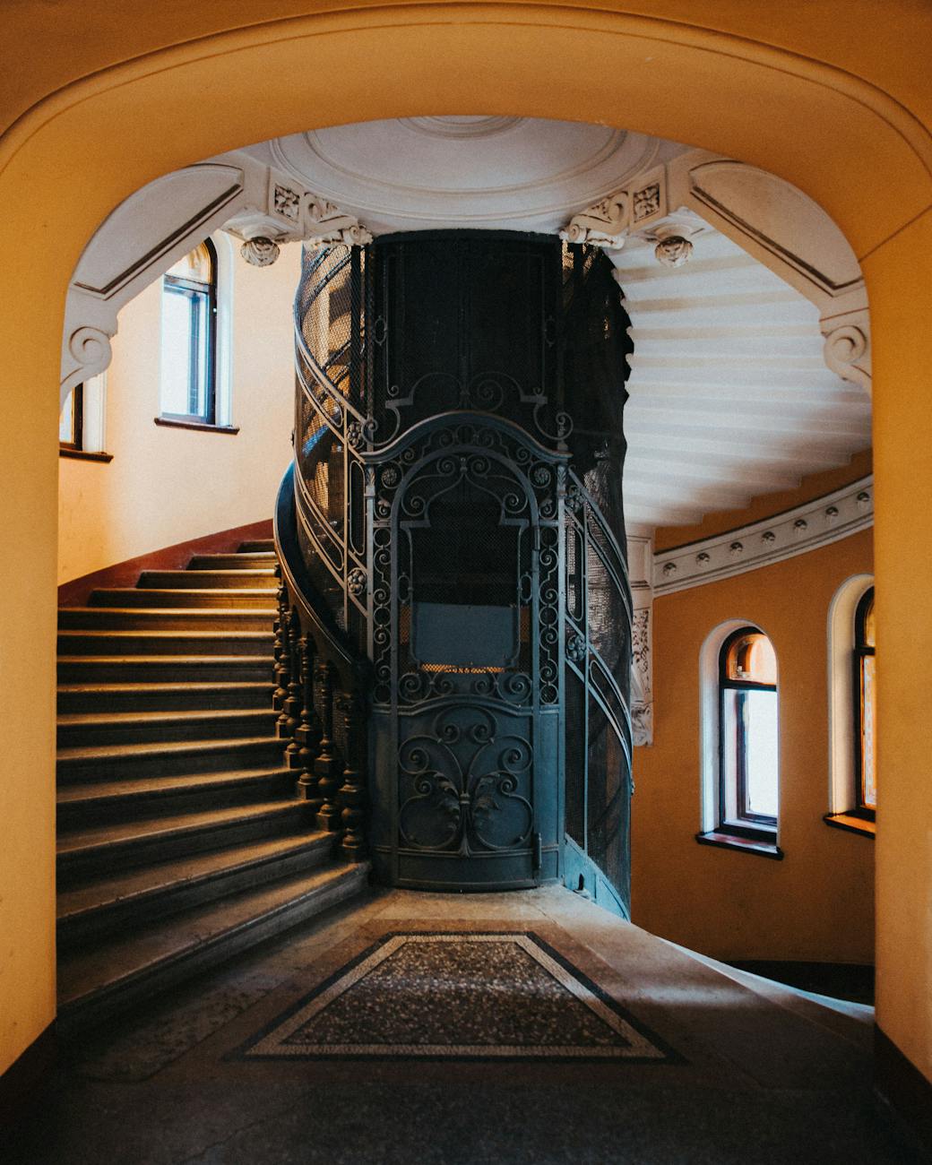 vintage elevator and stairway in an old building